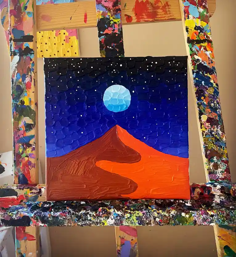 A thickly textured painting on canvas depicts a stylized mountain in orange and brown beneath a blue night sky with white…