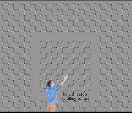 A person in a blue shirt and khaki pants stands with arms raised in surprise or frustration against a gray, grid-patterned…