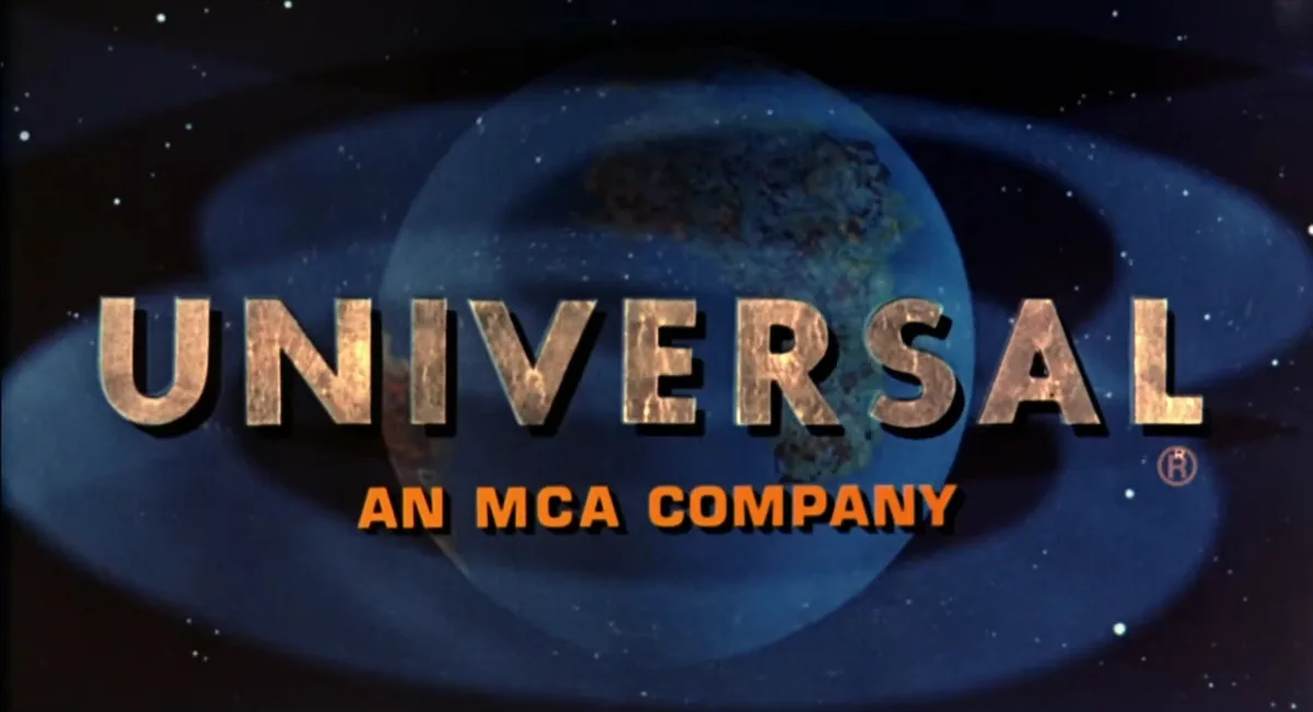 The image displays the classic Universal Pictures logo from the 1980s, featuring the word 'UNIVERSAL' in large, metallic…
