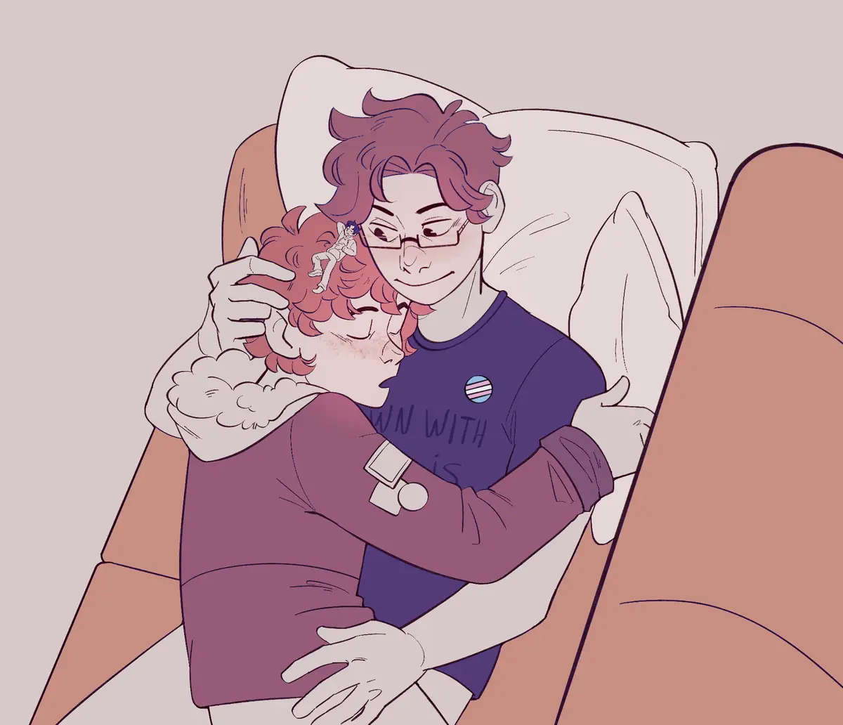 An illustration shows two people in a cozy embrace on a couch; one person wears a shirt with a trans flag pin and has a…