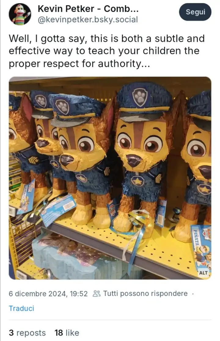 A row of Paw Patrol-themed piñatas, shaped like police dogs in blue uniforms and hats, are displayed on a store shelf. The…