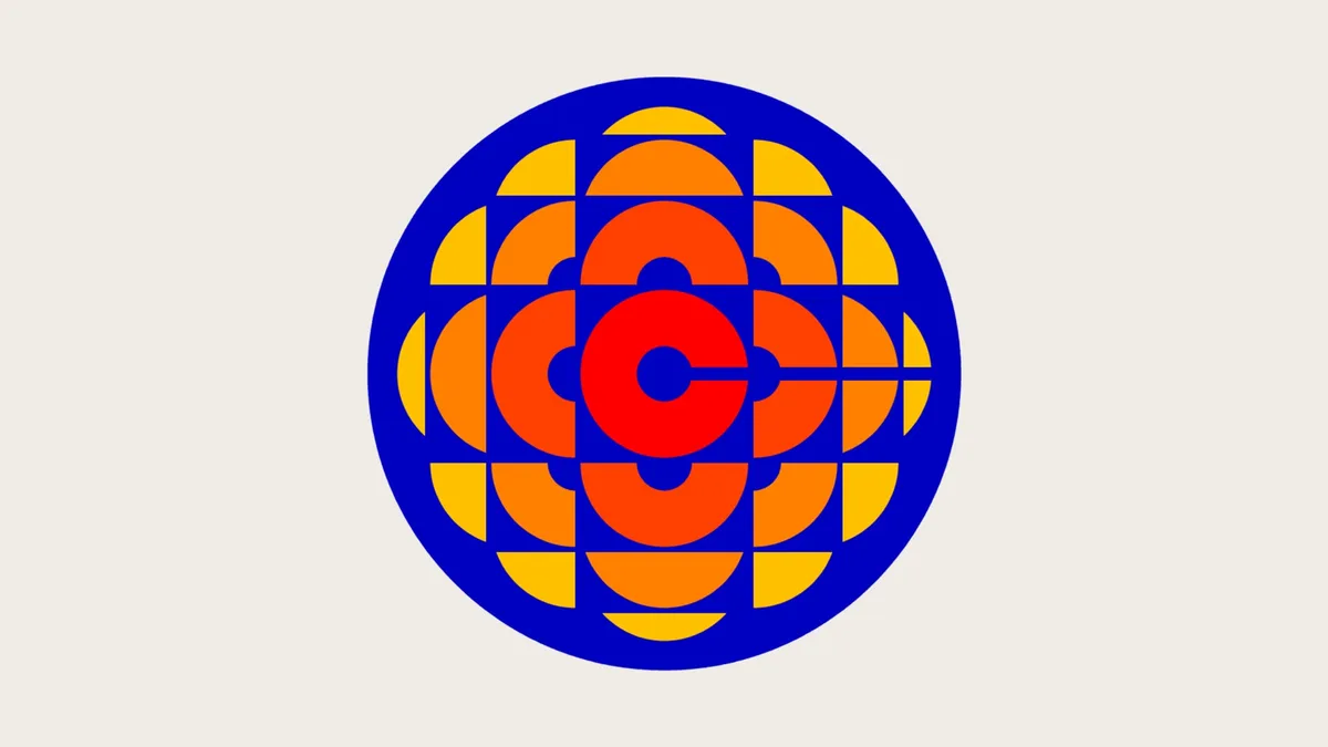 A geometric logo featuring concentric circles and semi-circles in blue, orange, and red, arranged in a symmetrical pattern…