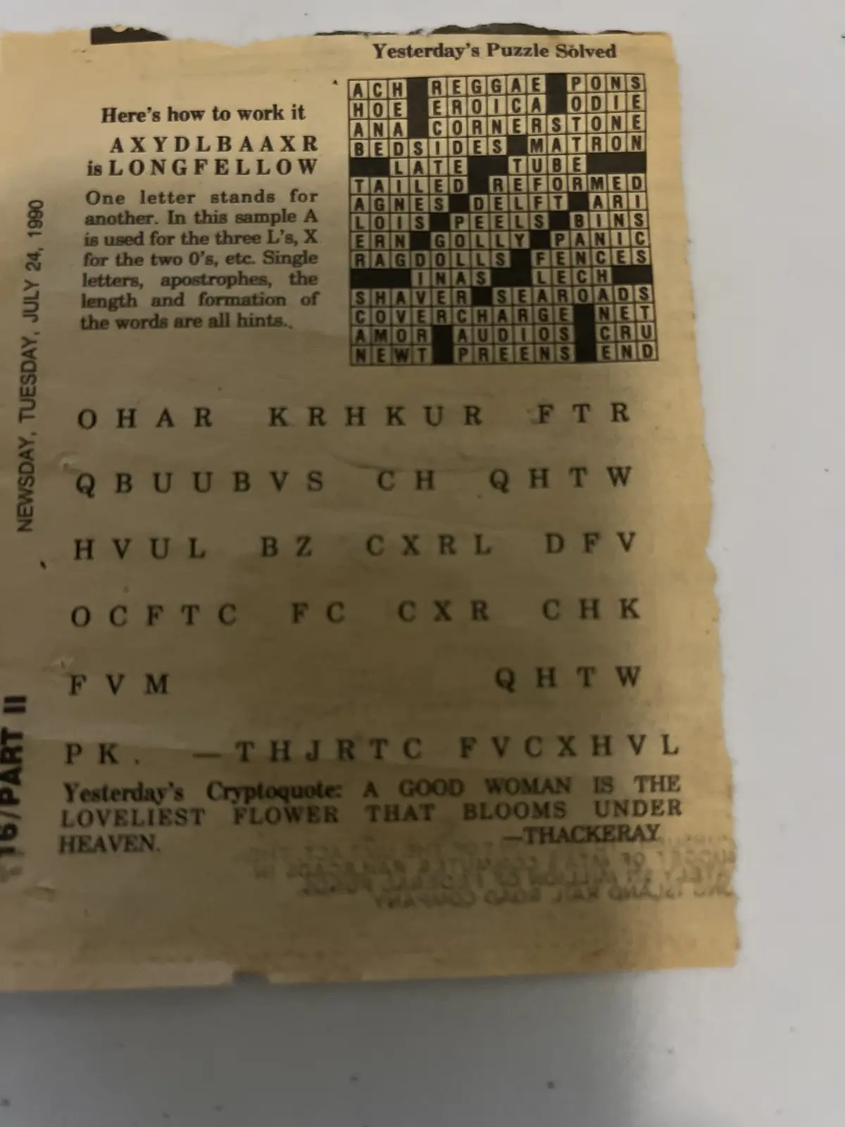 A yellowed newspaper clipping from July 24, 1990, shows a cryptic crossword puzzle solution with a grid of words like…