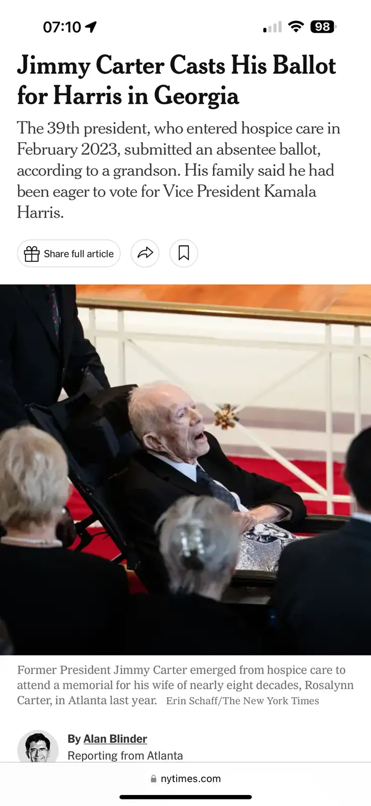A screenshot of a New York Times article shows former President Jimmy Carter in a wheelchair, looking upward with his mouth…