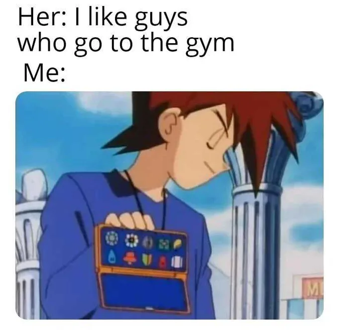 An anime character with red hair, wearing a blue jacket, is shown looking down with a dejected expression while holding a…