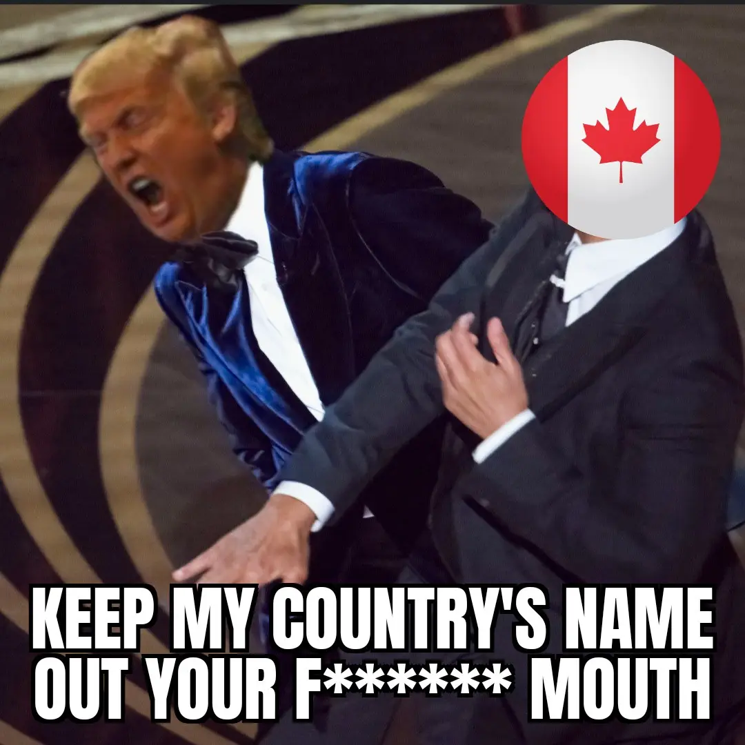 A man in a blue velvet tuxedo is yelling while grabbing another man in a black suit by the chest. The second man's face is…