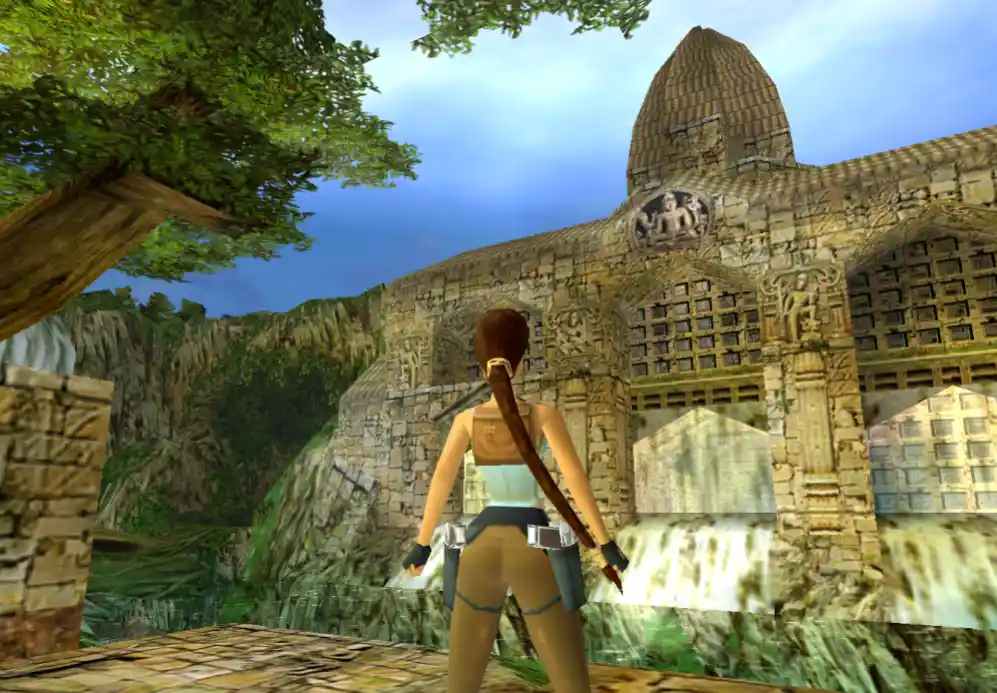A screenshot from the video game 'Tomb Raider' shows the protagonist, Lara Croft, standing on a stone platform facing a…