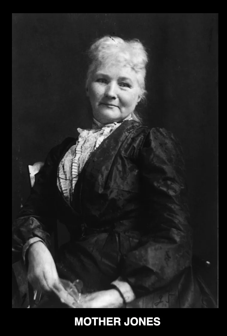 A vintage black-and-white portrait of a woman with white hair, wearing a dark, high-collared dress with lace trim, seated…