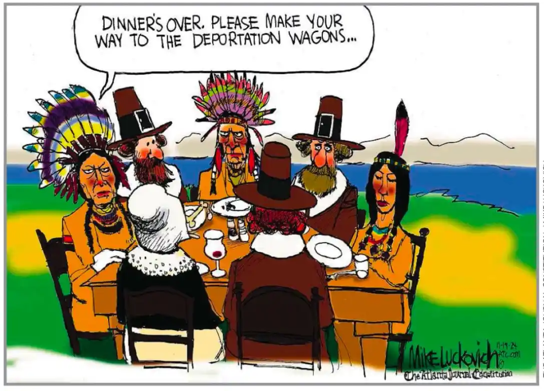 A cartoon depicts a group of people dressed as pilgrims and Native Americans seated around a dinner table. One character, a…