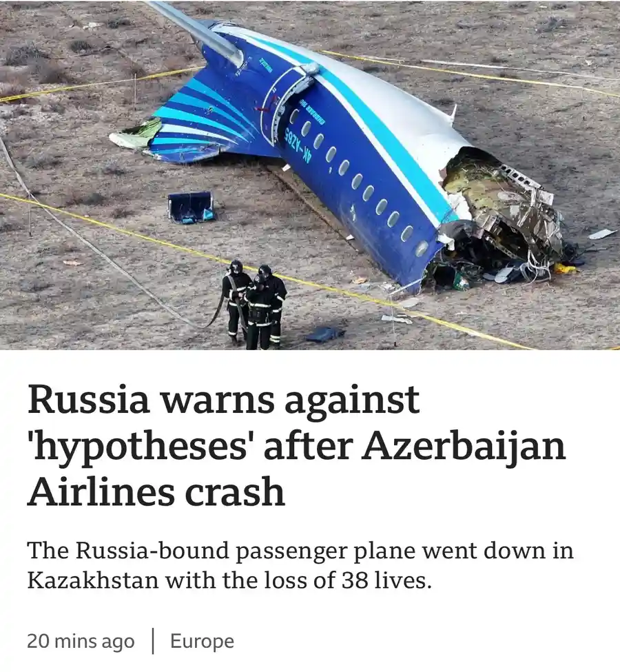 An aerial view shows the wreckage of a blue and white Azerbaijan Airlines plane, registration number AК-AZ65, lying on dry…