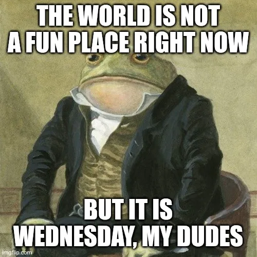 A green frog wearing a black suit and white shirt sits in a chair, looking somber. The text overlaid on the image reads 'THE…