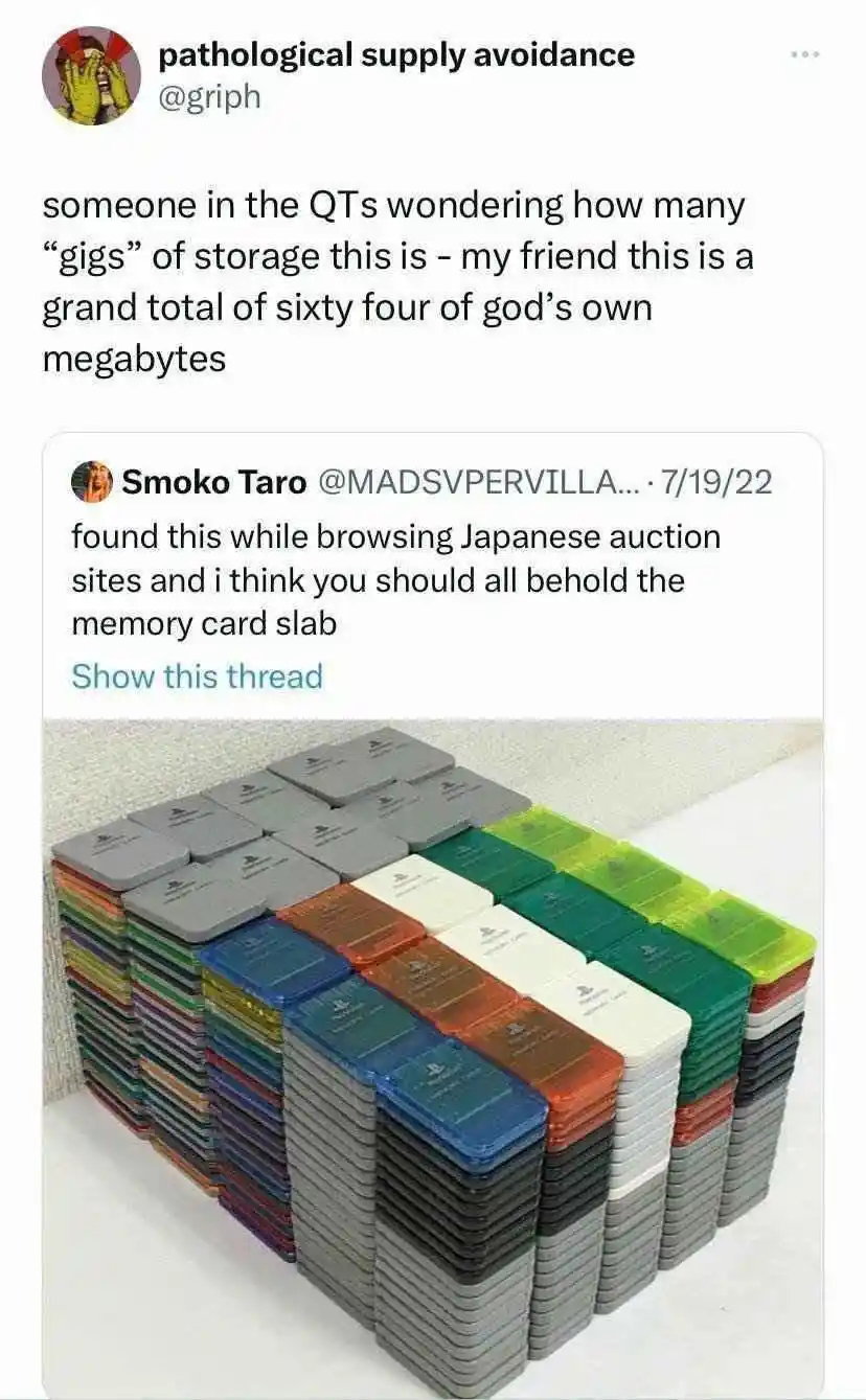 The image shows a large, organized stack of colorful PlayStation memory cards arranged in multiple columns on a white…