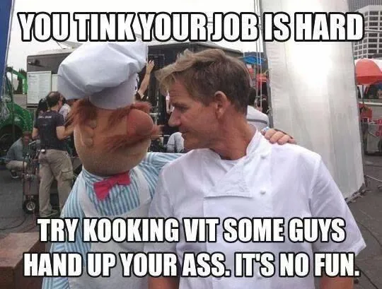 A man in a chef's uniform has his arm around a person in a pig costume wearing a chef's hat and bowtie. The image has bold…