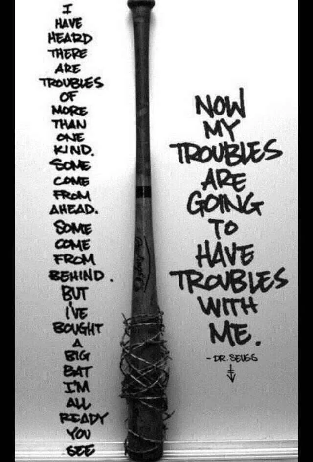 A black-and-white image shows a baseball bat wrapped in barbed wire standing upright against a wall. Handwritten text is…