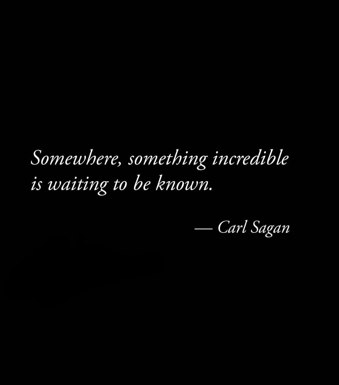 A black background with white cursive text displaying the quote 'Somewhere, something incredible is waiting to be known.'…