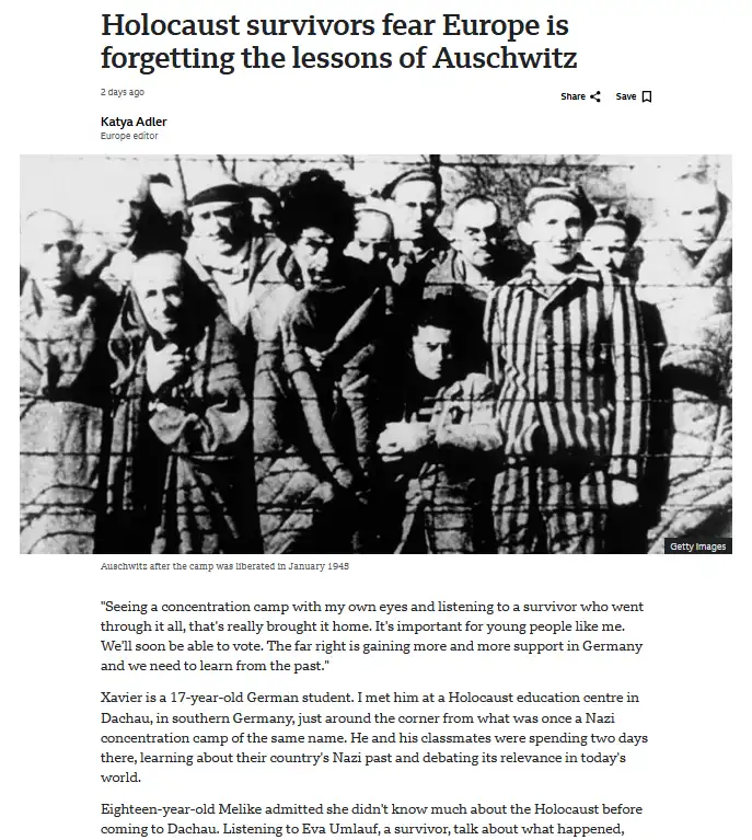 A black-and-white historical photo shows a group of emaciated, striped-prison-clothed survivors standing behind barbed wire…