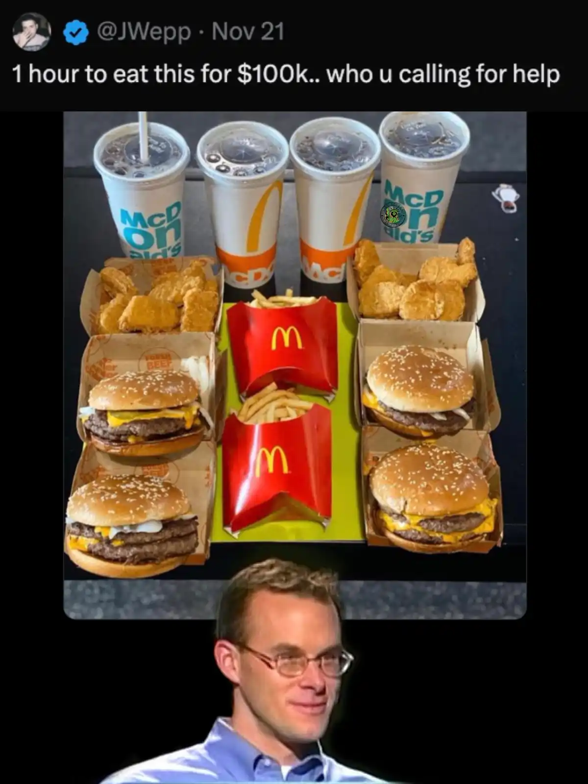An image displays a large, messy spread of McDonald's food including four drinks, two boxes of chicken nuggets, two boxes of…