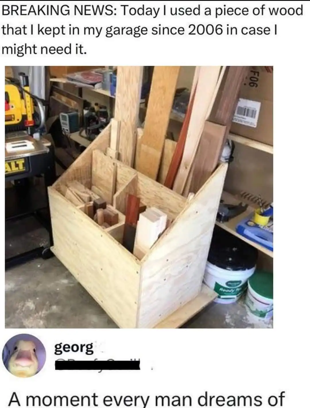 A photo of a wooden storage bin filled with various pieces of wood, situated in a cluttered garage next to a table saw and…