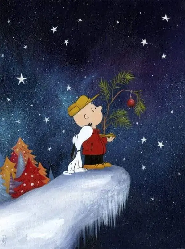 A classic Peanuts cartoon image shows Charlie Brown and Snoopy sitting atop a snowy cliff under a starry night sky. Charlie…