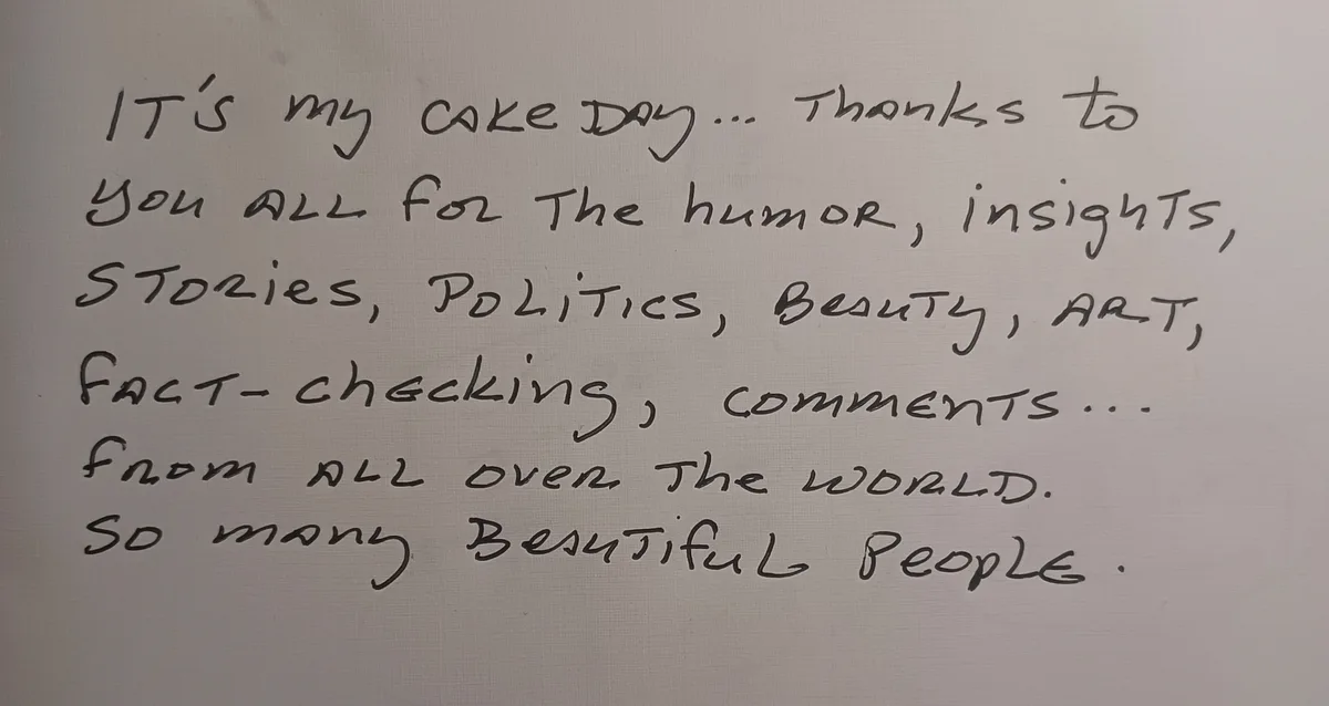 A handwritten note on textured white paper reads a heartfelt message thanking an online community for their contributions…
