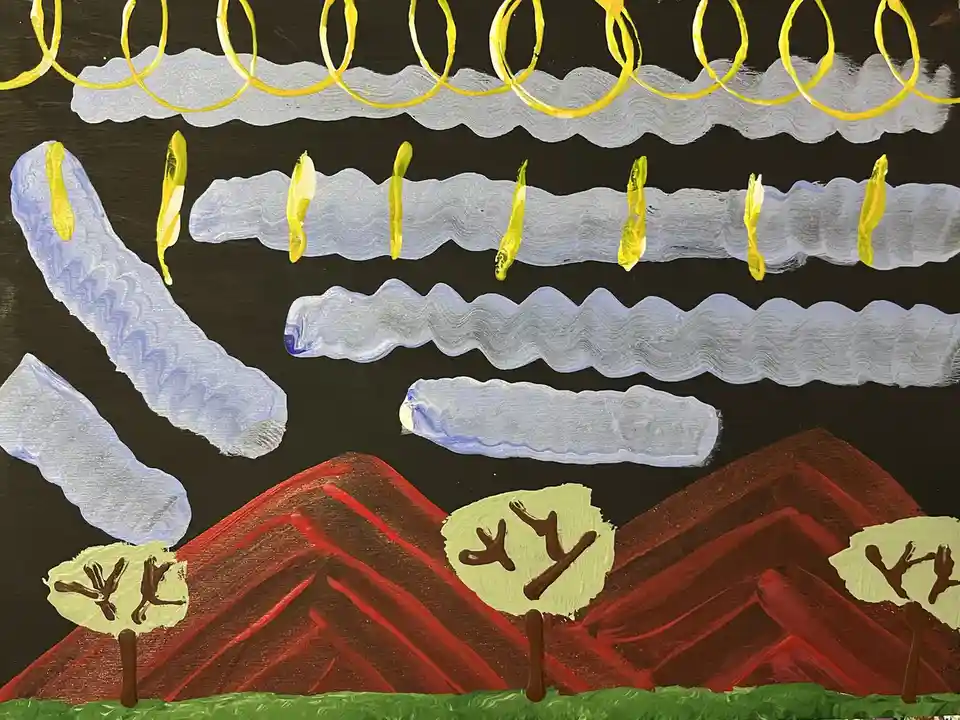 A childlike painting depicts a dark sky with wavy gray clouds, yellow sun rays, and red mountains with green trees. The…