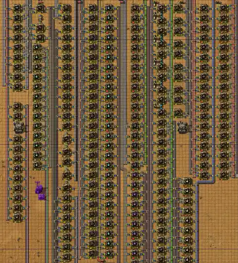 An overhead view of a complex, highly organized factory layout from the game Factorio, featuring numerous conveyor belts…