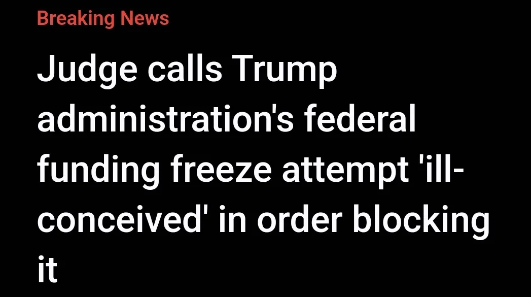 A black background with red 'Breaking News' header and white text stating a judge labeled the Trump administration's federal…