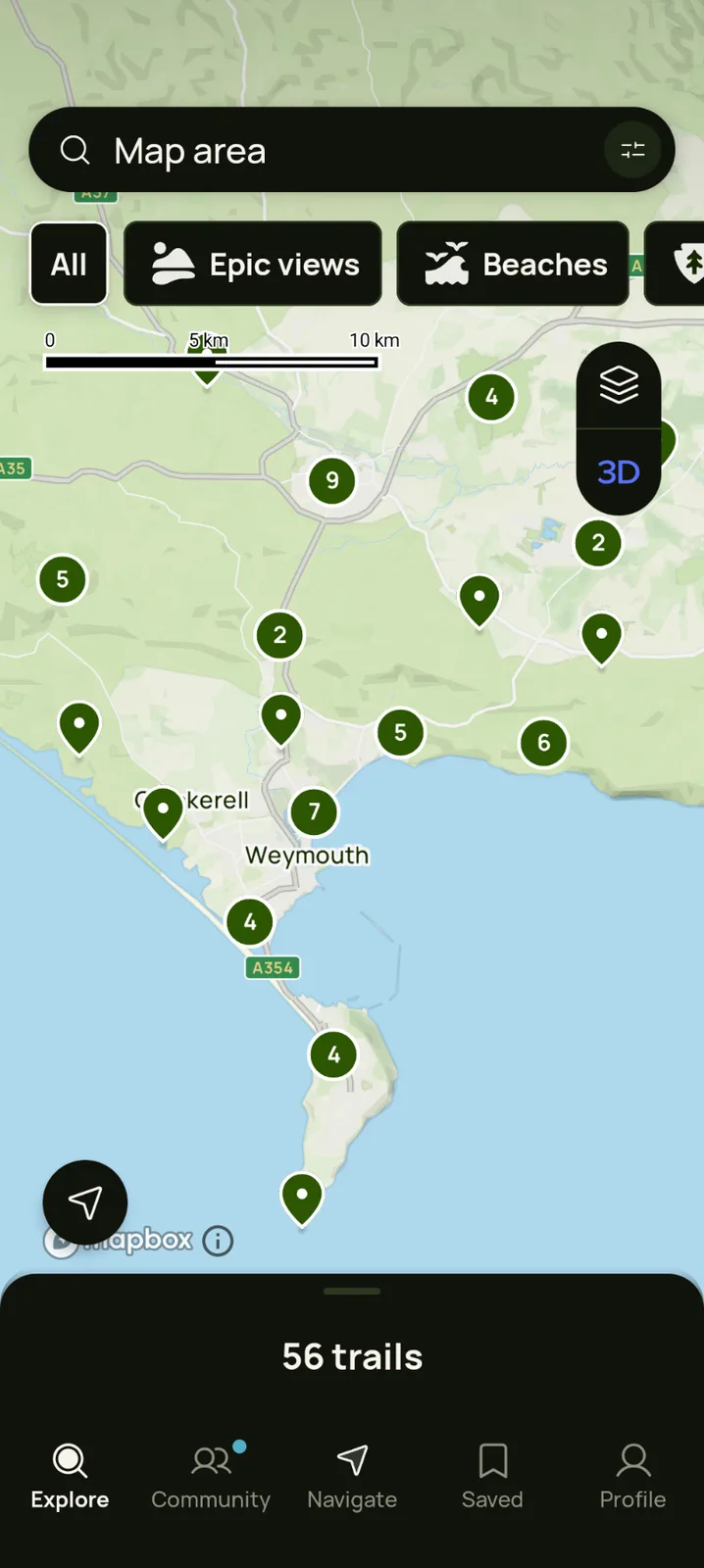 A screenshot of a hiking app map showing a coastal area with numerous green trail markers, a search bar, and filter buttons…