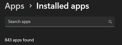 A screenshot of a dark-themed app store interface showing 'Apps > Installed apps' with a search bar and the text '843 apps…
