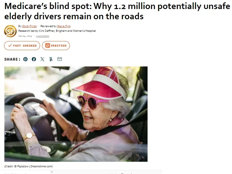 An elderly woman with white hair, wearing a pink visor and sunglasses, is smiling while driving a car with both hands on the…