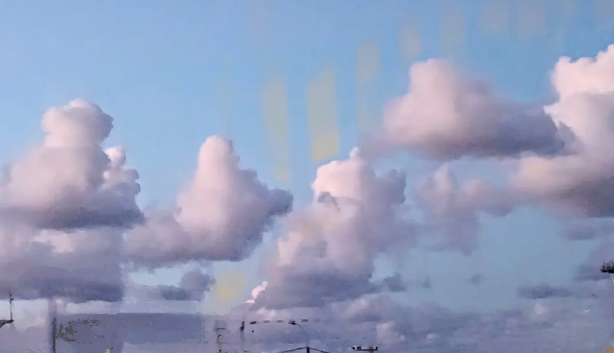 A soft, painterly image of fluffy clouds against a pale blue sky, with faint yellow vertical streaks in the background. The…