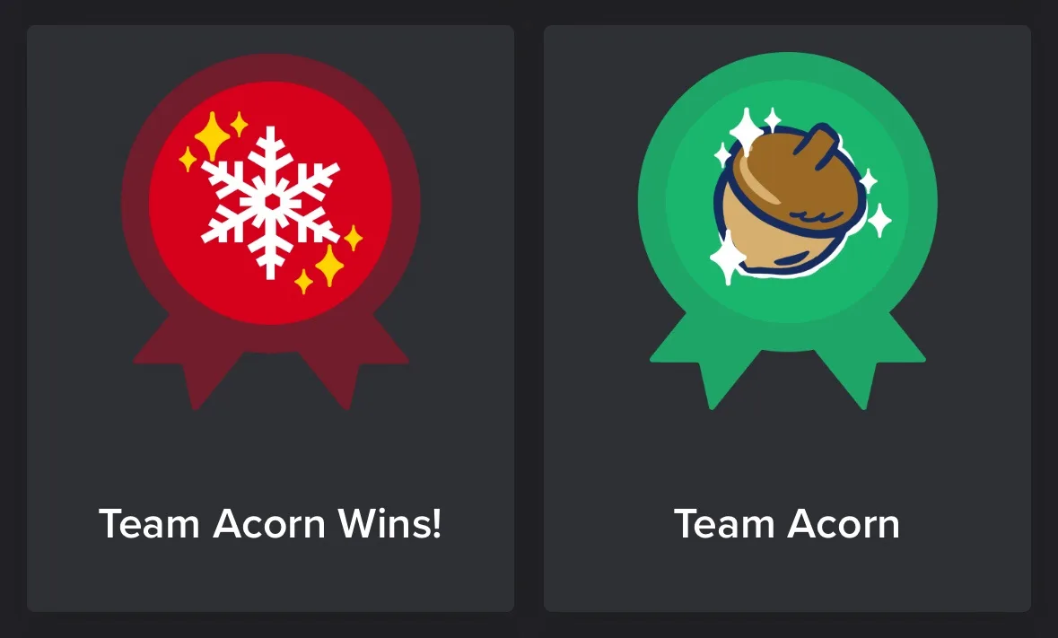 Two side-by-side digital badges: the left is a red ribbon with a snowflake and stars, labeled 'Team Acorn Wins!'; the right…