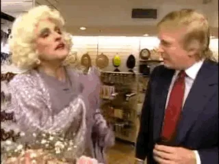 A six-panel sequence from a TV show shows a man in a suit approaching a woman in a sparkly dress, touching her back, kissing…