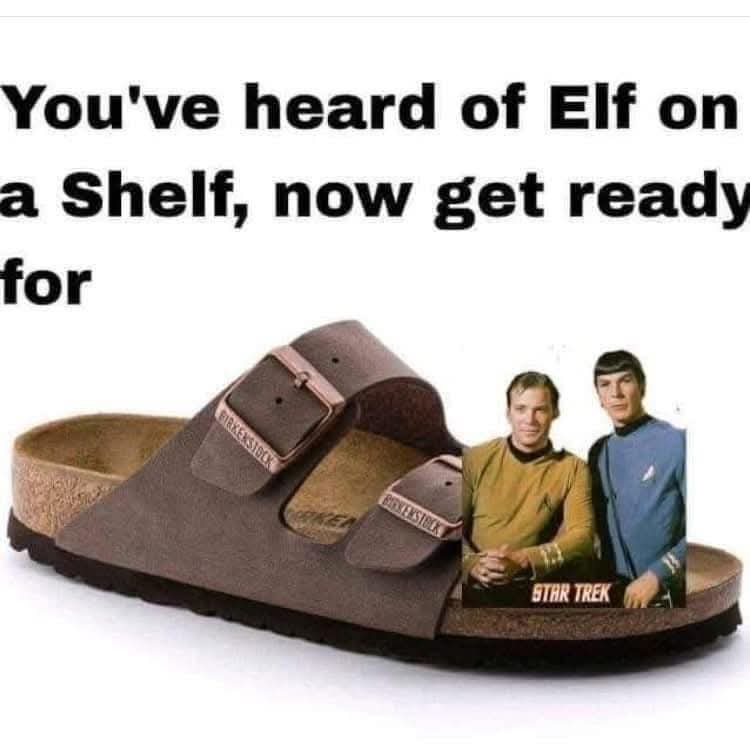 A brown Birkenstock-style sandal with a cork footbed and two adjustable straps. Superimposed on the insole is a small image…