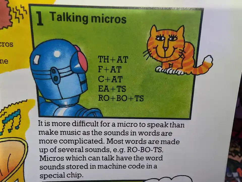 A colorful educational illustration shows a blue robot and an orange tabby cat next to phonetic sound combinations like…