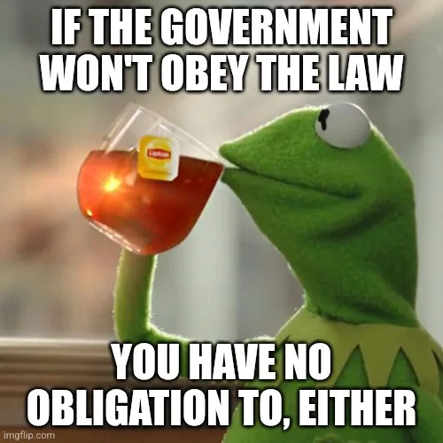 A green frog puppet, Kermit the Frog, is shown sipping tea from a clear glass mug with a Lipton tea bag visible inside. The…