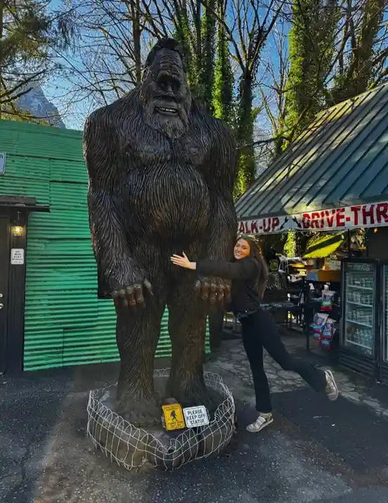 The sign clearly doesn't ask for a statue's approval