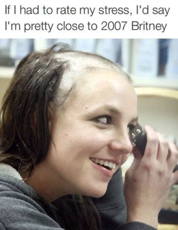 A close-up photo of Britney Spears with visible thinning hair on top of her head, smiling while holding a phone to her ear…