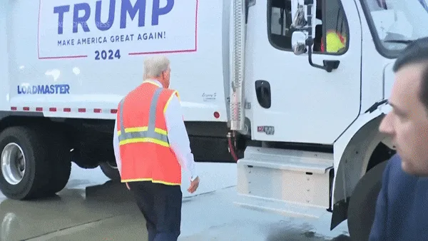 A sequence of images shows Donald Trump in an orange safety vest standing beside a white Loadmaster truck with 'TRUMP MAKE…