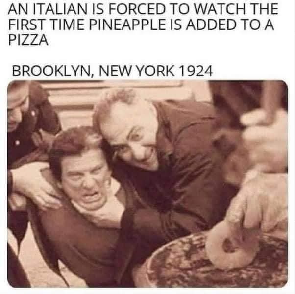 A sepia-toned photo shows a man with a horrified, screaming expression being held by another man who is grinning while…
