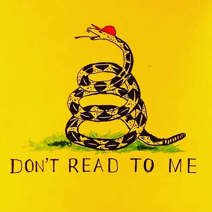 A coiled rattlesnake with a red hat on its head, set against a bright yellow background with green grass at its base. The…
