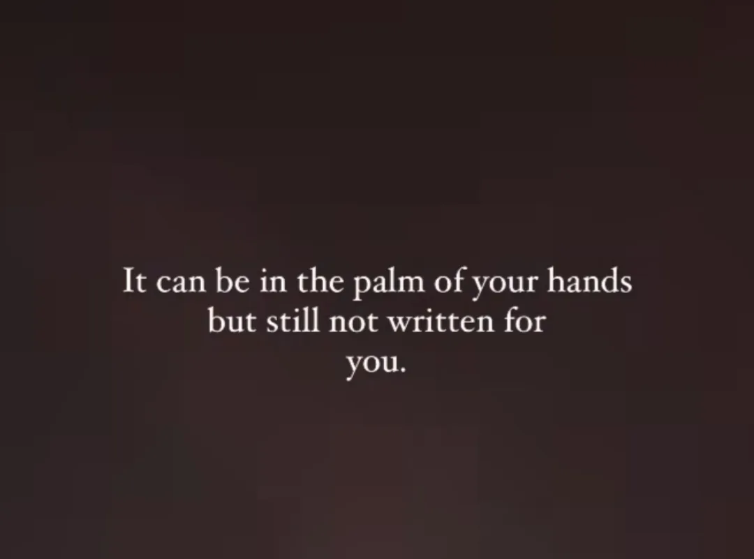 A dark brown textured background displays white serif text centered in three lines: 'It can be in the palm of your hands but…