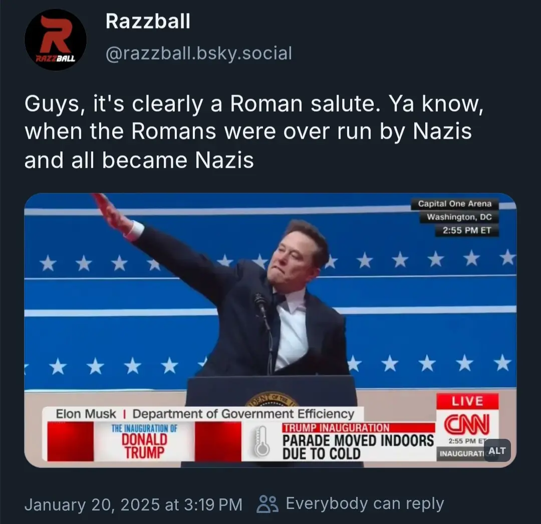 A screenshot of a CNN news broadcast shows Elon Musk at a podium with a blue starry backdrop, raising his right arm in a…