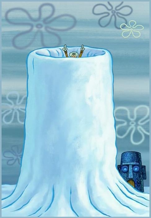 A cartoon character, resembling SpongeBob SquarePants, is partially buried in a large, upright iceberg with only his head…