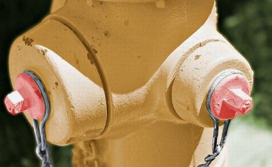 A close-up photo of a yellow fire hydrant with two red caps and chains, overlaid with the text 'i'm not a fire hydrant, i'm…