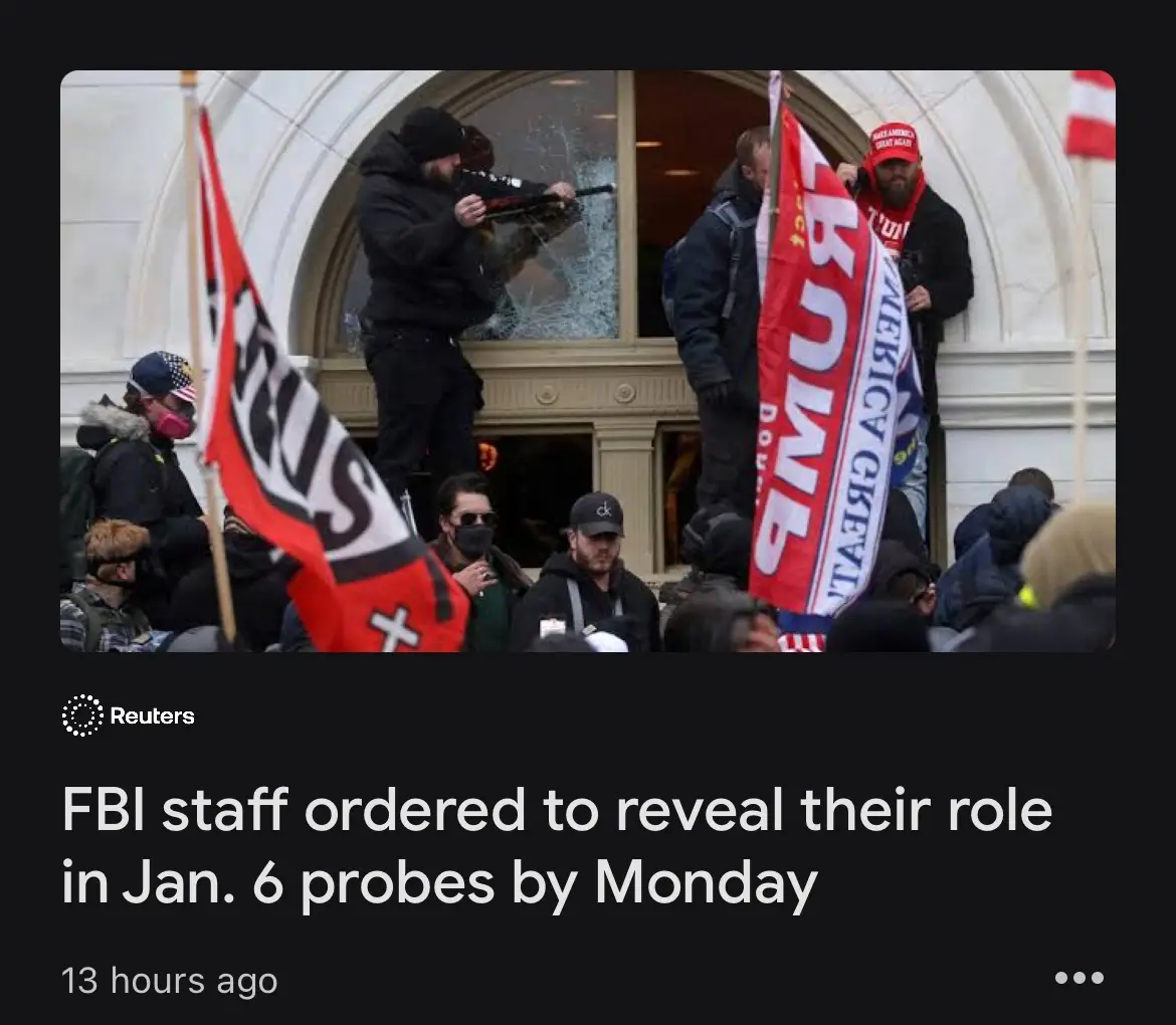 A photo shows rioters at the U.S. Capitol on Jan. 6, 2021, with one man aiming a rifle through a shattered window while…