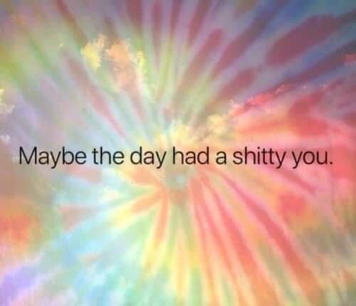 A psychedelic tie-dye background with radiating rainbow colors and soft cloud-like textures. Centered on the image is the…