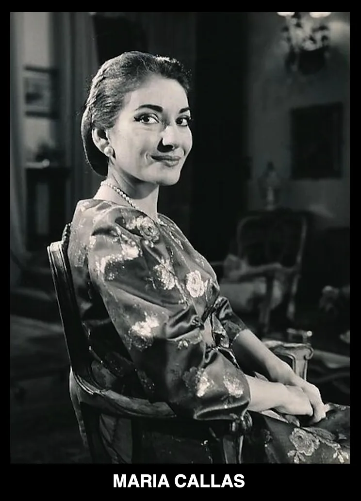 A black-and-white photograph shows Maria Callas seated in an ornate chair, wearing a floral-patterned satin dress and a…