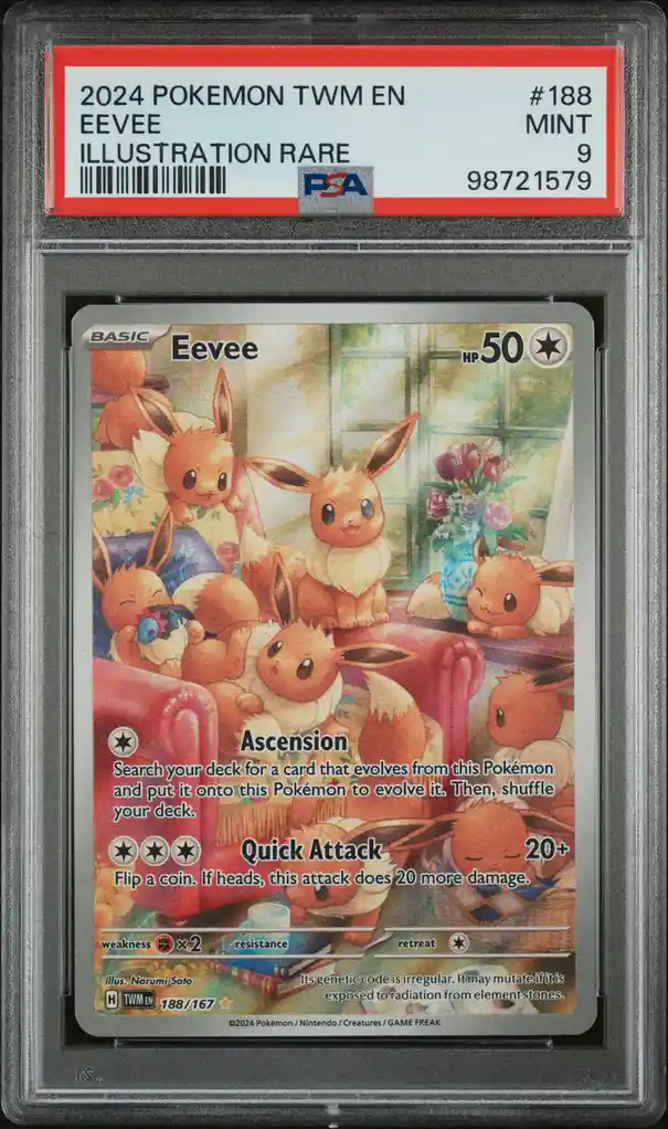 A Pokémon TCG card of Eevee, illustrated with multiple Eevee characters in a cozy living room scene, is encased in a PSA…