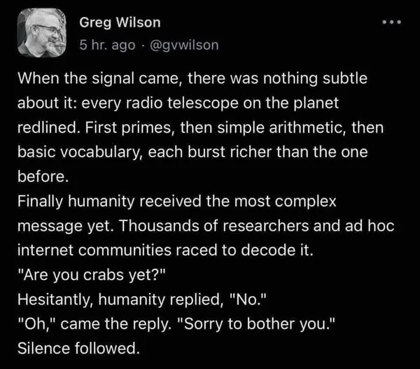 A screenshot of a tweet by Greg Wilson showing a fictional alien message scenario where humanity decodes increasingly…